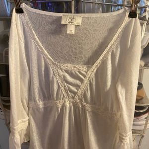 White floral and lace long sleeve shirt.